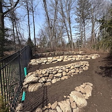 Custom-Retaining-Wall-Built-to-Prevent-Backyard-Erosion-in-Upper-Saddle-River-NJ 0