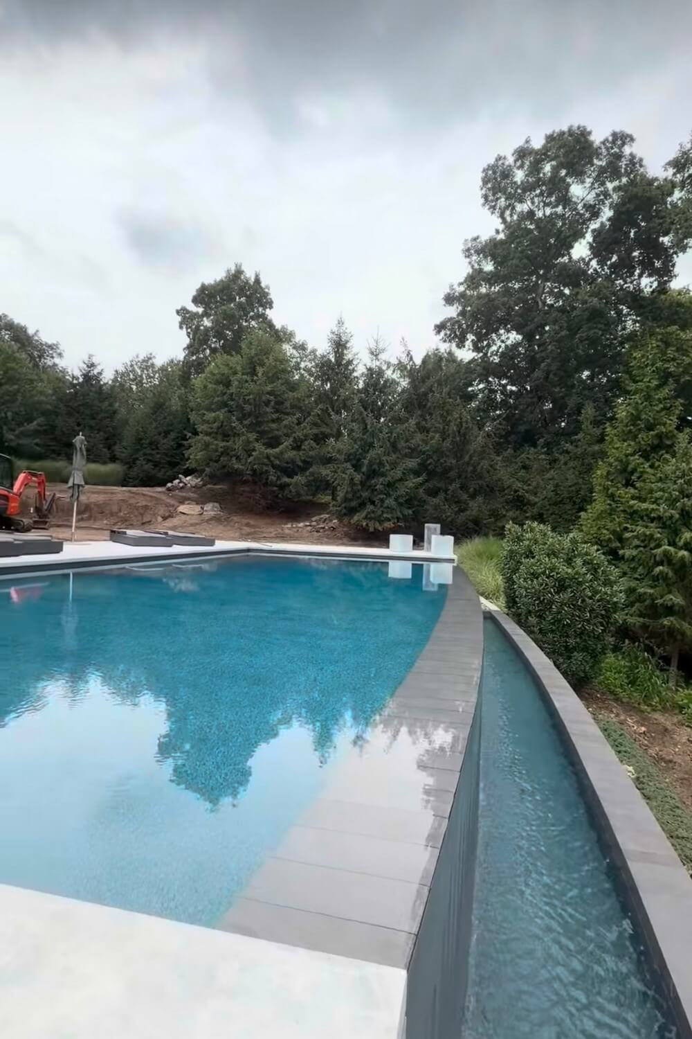 Oasis Pool Construction Builds a Luxurious Pool with an Infinity Pool Feature in Franklin Lakes, NJ